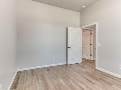 Empty room featuring light wood-type flooring