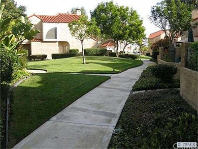 VIEW DOWN GREENBELT FROM REAR PATIO