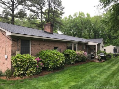 Rear view towards detached garage