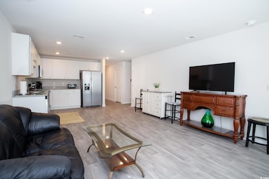 Living room featuring light hardwood / wood-style flooring