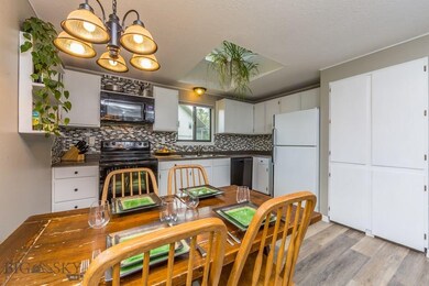 140 Spruce Cone Dr unit 52, Big Sky, MT 59716 - photo 3