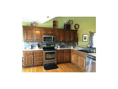 Updated kitchen brings ceramic backsplash with lar
