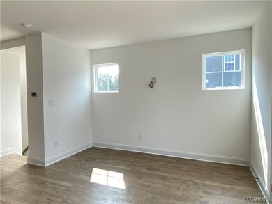 Empty room featuring light hardwood floors