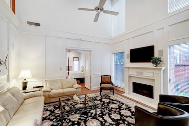 Relax in this wonderful great room with soaring ceilings
