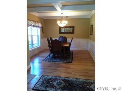 Dining Room. Gorgeous paneled wainscoting and coff
