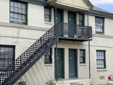 The view of the back of the 4-Plex. 2 units on 1st