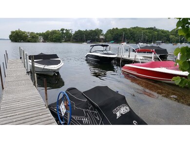 Shared dock on Lake Minnetonka abuts Deephaven bea