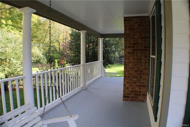 Welcome home! View of the amazing 50' x 8' wrap ar