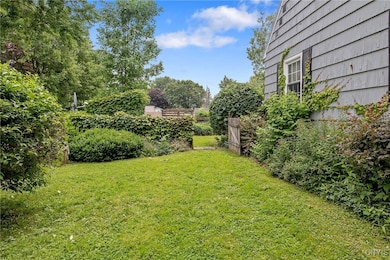SIDE VIEW GATE LEADING TO BACK YARD
