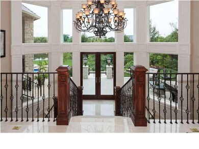 Dramatic staircase to the lower level
