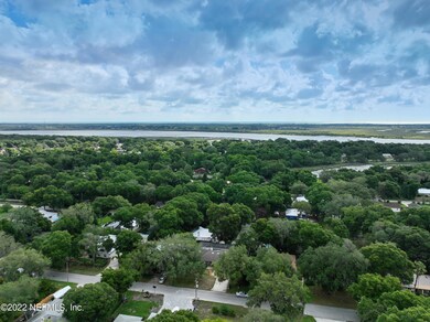 aerial over street looking east towards