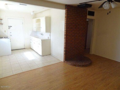 View into kitchen from living room