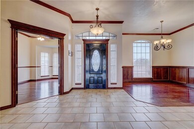 Spacious Entry flanked by Study and Dining Room