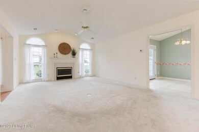 Living room opens to dining area