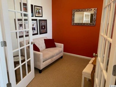 Enclosed by French Doors with glass, this room can