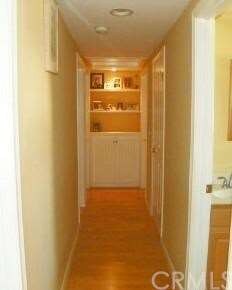 Hallway with extra large linen closets