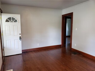 FRONT LIVING ROOM AND FRONT DOOR