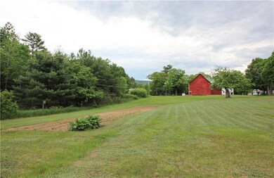 Front lawn with garden 1 1/2 +/-...
