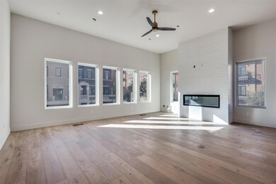 Second floor living room featuring 12 foot ceiling