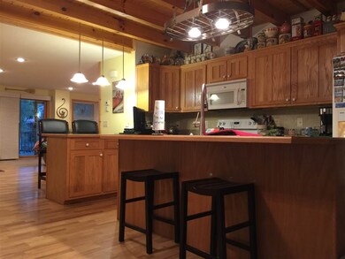 Island, breakfast bar, & room for small table!