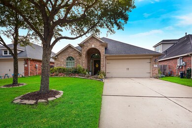 Stunning brick elevation with 2 car garage. Upgraded front door. Make your appointment and come on in!!