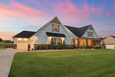 View of front of property with concrete driveway, 