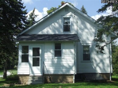 Enclosed rear porch makes a great mudroom before e