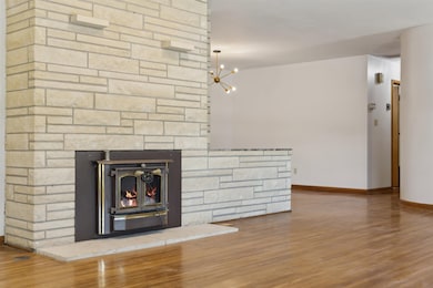 Large stone fireplace with planter box