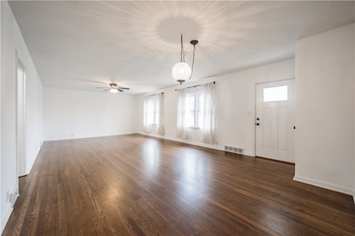 Spacious living area upon entry to the home.