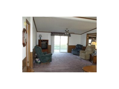 Standing at front door looking through living room