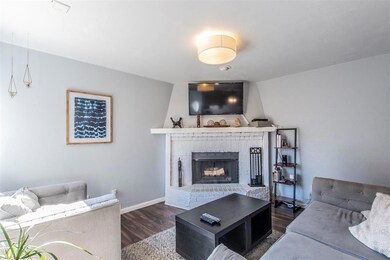 Cozy, warm Living Room with wood burning Fireplace