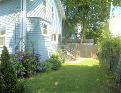 Private yard with a rear fence that opens to Gladd