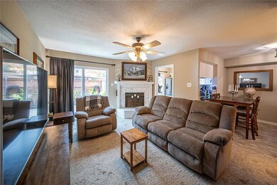 Living area view of the wood burning fireplace and