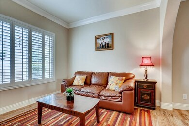 Formal living room with 6 inch crown molding.