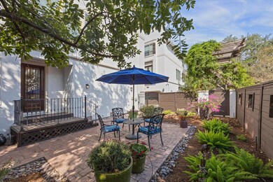This patio home offers a beautiful yard full of lu