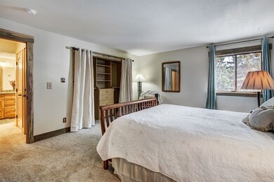 Primary Bedroom with custom built in oversized clo