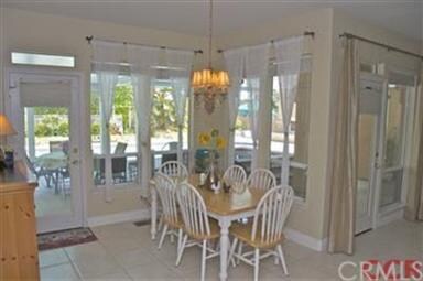 Informal dining looking over the patio and pool.