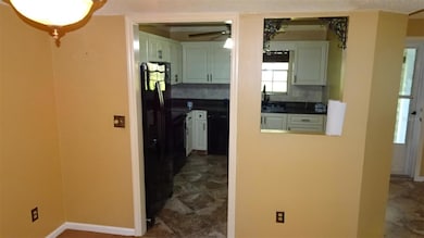 View into kitchen from dinette.