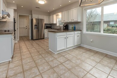 Spacious kitchen with new dishwasher and plenty of