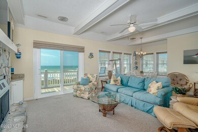 Open living room w/ fireplace