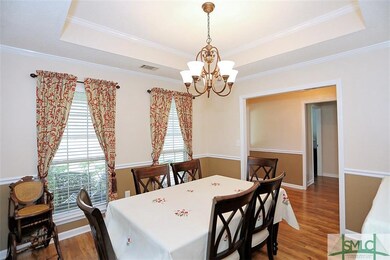 Formal dining room with one of 3 tray ceilings in 