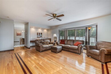 Spacious family room with beautiful hardwood floor