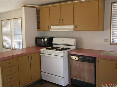 Kitchen view stove and dishwasher