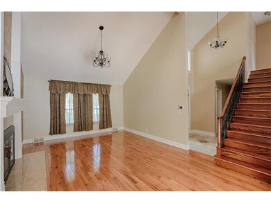 Vaulted Living Room with Fireplace and hardwoods