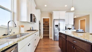MODEL HOME PHOTOS, COLORS AND SELECTIONS DO VARY.