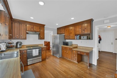 Kitchen featuring sink, stainless steel appliances