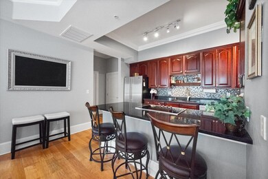 Kitchen featuring sink, high end fridge, a kitchen