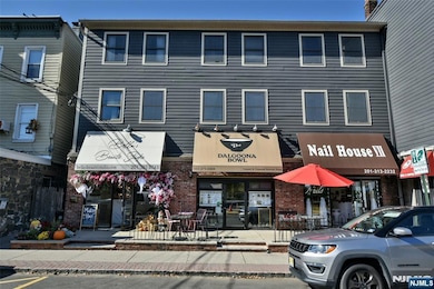 Front of the building Entrance to apartments in the rear.