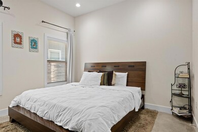 Bedroom featuring carpet floors and recessed ligh