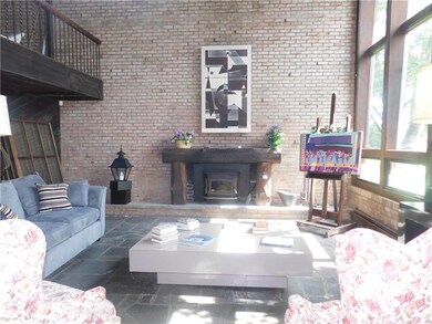 Living room with fireplace with an insert
